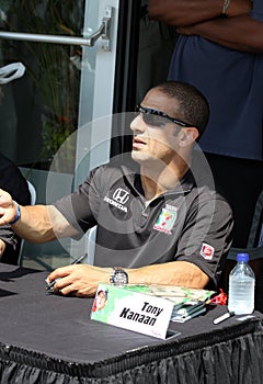 Racecar Driver Tony Kanaan Signing Autograph at INDY 500 Community Day