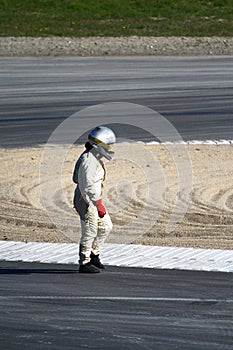Racecar driver walking