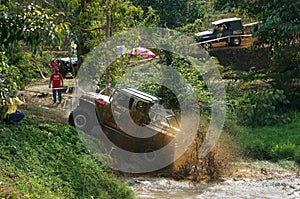 Racer offroad at terrain racing car competition