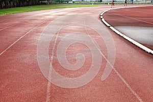 Racetrack in sport arena with grass