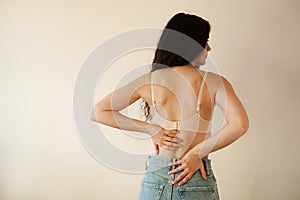 Rachiocampsis bachache of woman. Scoliosis is sideways curvature of the spine. Rheumatism and arthritis diseases.