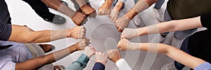 Racial Diversity Team Huddle: Spirited Fist Circle