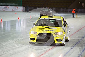 Racing car on ice in sports complex