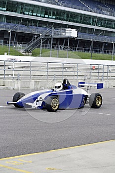 Racing car participant practicing. Conceptual image shot