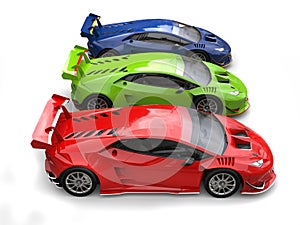 Racing cars in red, green and blue - top down side view