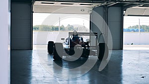 Racing cart in the workshop with nobody inside
