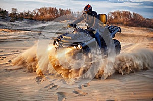 Racing in the sand on a four-wheel drive quad