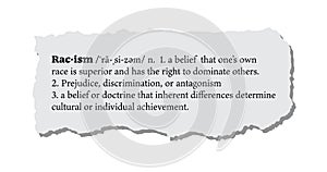 Racism Definition on a Torn Piece of Paper