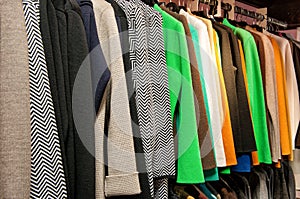 Rack of Colorful Garments Hanging on Rod