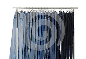 Rack with different jeans isolated