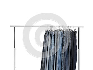 Rack with different jeans isolated