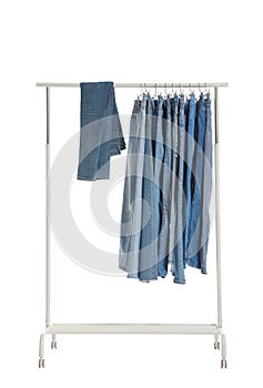 Rack with different jeans isolated