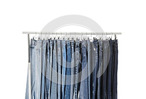 Rack with different jeans isolated