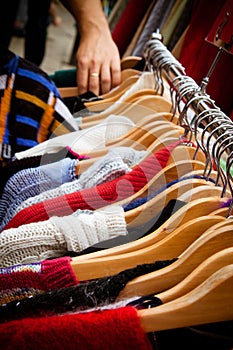 Rack of jumpers at market