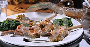 A rack of lamb in crusted mint sauce