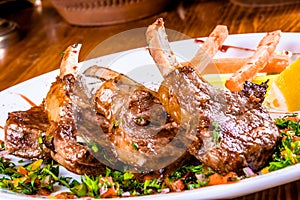 Rack of lamb with vegetables and herbs