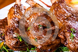 Rack of lamb with vegetables and herbs