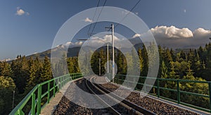 Rack rail in Strba station under Vysoke Tatry mountains in summer