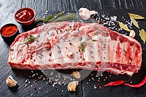Rack of raw pork spare ribs photo