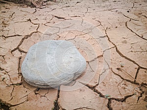 Racked ground and stone. The global shortage of water on the planet. Global warming