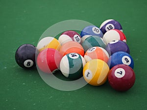 Racked Pool Balls in a Triangle
