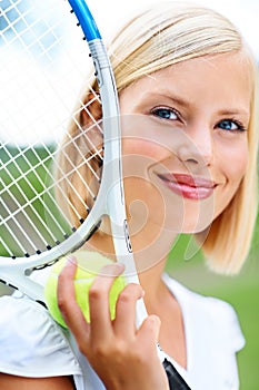 Racket, portrait or happy woman with a ball in tennis training match, fitness exercise or game outdoors. Smile, healthy