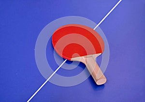 Racket for table tennis on a table