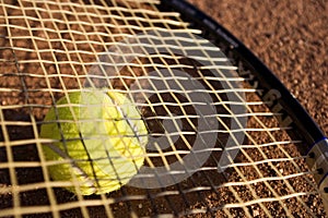 A racket and a tennis ball