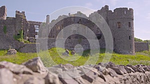 A racking focus of the ruins of an old castle