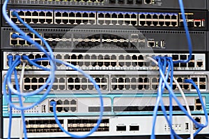 racks with network equipment and patch cord cables