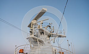 Radar antenna on the mast of a cruise ship