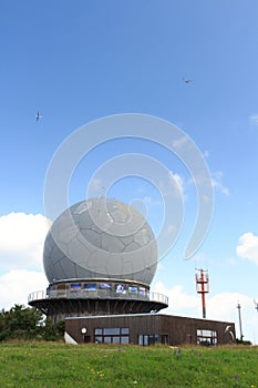 Radar dome on mountain Wasserkuppe with gliders sailplanes in Rhön Mountains, Germany