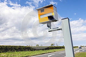 Radar speed camera in the uk background