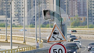 Radar speed control camera and signs on the road