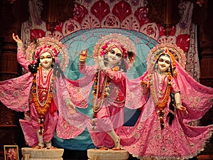 Radha and Krishna in pink attire