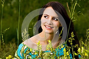 Radiant beautiful woman outdoors in nature