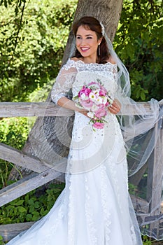 Radiant bride in garden