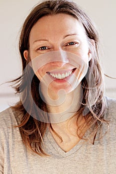 Radiant girl smiling during sunny breakfast morning