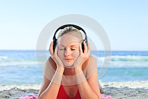 Radiant woman listening to some music