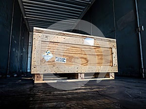 Radiation label beside the transport wooden box package