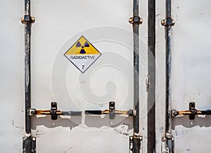 Radiation warning sign on the Dangerous goods transport label Class 7 at the container of transport truck