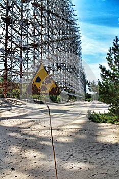 Radiation warning sign in front of the Duga-1 radar near Pripyat, Chernobyl exclusion zone, Ukraine