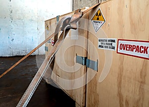 Radiation warning sign transport label Class 7 on the Dangerous goods package type A in the container of transport truck