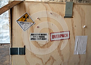 Radiation warning sign transport label Class 7 on the Dangerous goods package type A in the container of transport truck