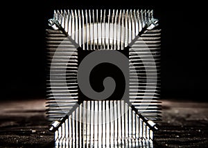 The radiator of the cooling system of the computer processor in the backlight.