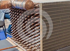 Radiator of a refrigeration monoblock made of aluminum and copper