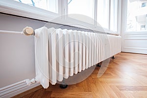 Radiator and thermostat in flat - heater closeup