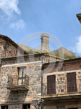 Radicofani, a medieval village with a castle and stone houses located on a Tuscan hill, Italy