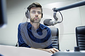 Radio anchorman hosts the program photo