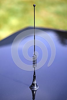 Radio antenna on a vintage car